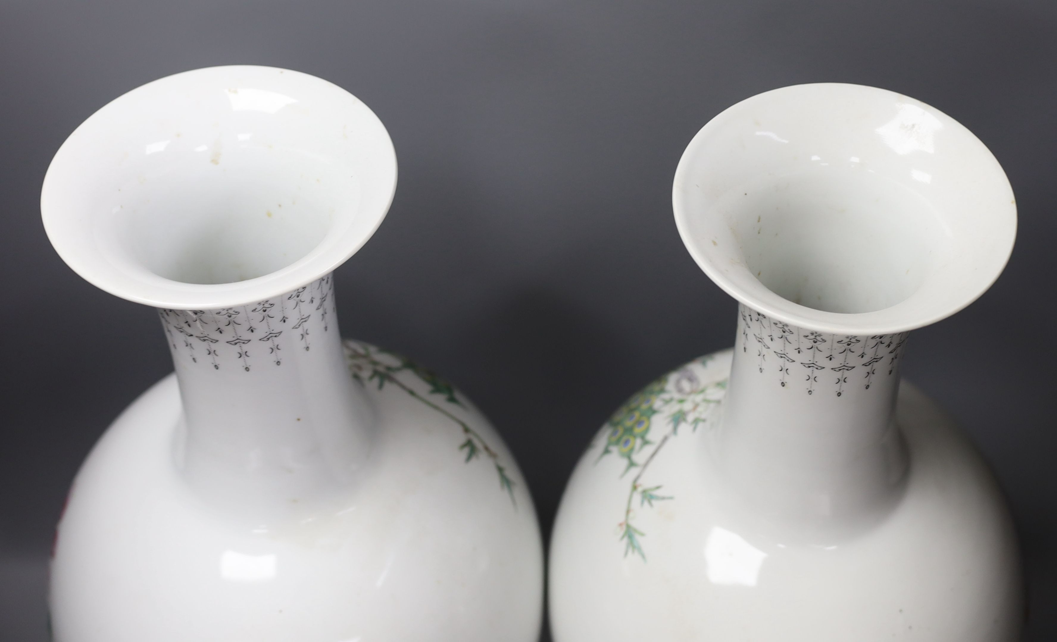 A pair of large Chinese famille rose peacock inscribed vases - 50cm tall